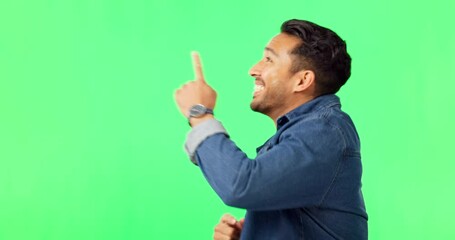 Wall Mural - Asian man, pointing and dancing on green screen in product placement or advertisement against studio background. Portrait of happy male showing gesture or point for advertising or marketing on mockup