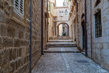 Wall Mural - Medieval stone street, illuminated by lanterns. Dubrovnik. Croatia. Europe