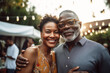 © TRINETTE + CHRIS - Portrait of mature black couple in backyard in the summer at family gathering. Generative AI.