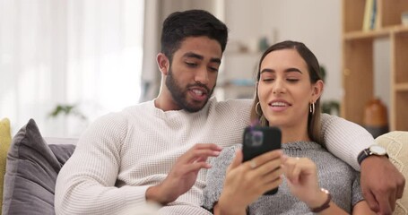 Wall Mural - Phone, happy and couple on sofa in home for bonding, quality time and relaxing in living room. Interracial relationship, love and man and woman on smartphone for social media, internet and website