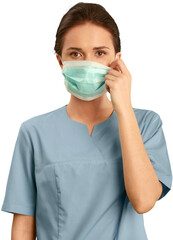 Canvas Print - Female healthcare worker wearing a face mask and scrubs