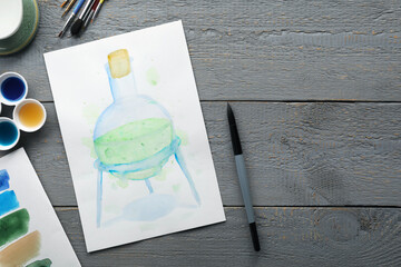 Sticker - Flat lay composition with watercolor painting of flask and brushes on grey wooden table. Space for text