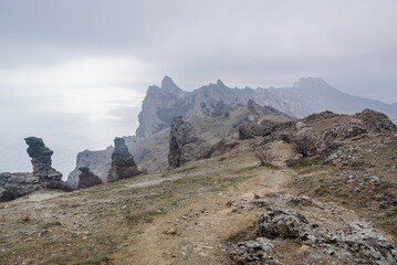 Wall Mural - Bizarre rocks in Dead city. Khoba-Tele Ridge of Karadag Reserve in spring. Crimea