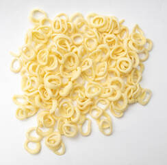 Wall Mural - Chips from onion rings on a white background.