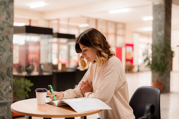 Wall Mural - College girl writing