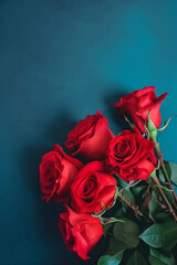 Wall Mural - bouquet of red roses on blue background