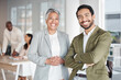 © M Bam/peopleimages.com - Business people, portrait smile and arms crossed in partnership at office for corporate leadership. Happy asian businessman and woman CEO smiling in teamwork, success or career ambition at workplace