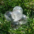 Closeup shot of quartz stones isolated on the background of the grass