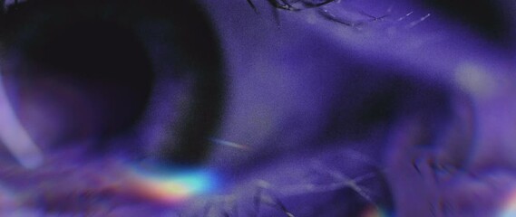 Wall Mural - macro shot of an eye with rainbow glass effect