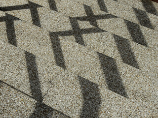 Canvas Print - stone stair street with shadow of railing