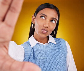 Poster - Selfie, happy woman and kiss in studio isolated on a brown background or backdrop. Thinking, idea and Indian person taking photo for memory, social media or profile picture for photography pout.