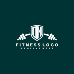 OM initial monogram for fitnes or gym logo with creative shield and barbell design