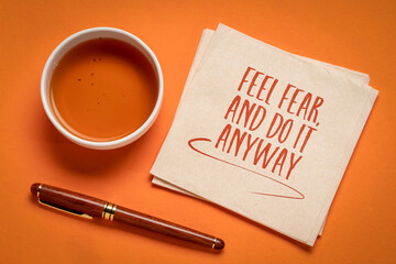 Wall Mural - Feel fear and do it anyway - inspiration handwriting, challenge, courage and personal development concept