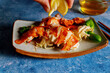 © ungvar - Fresh lobster is cooked perfectly in our gourmet dinner kitchen served with lemon making it delicious ocean food meal