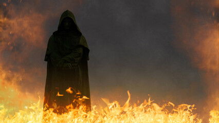 Wall Mural - dark hooded figure in hell features a dark statue figure in a hooded cowl standing in flames and smo