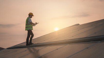 Wall Mural - service engineer checking solar cell on the roof for maintenance if there is a damaged part. enginee