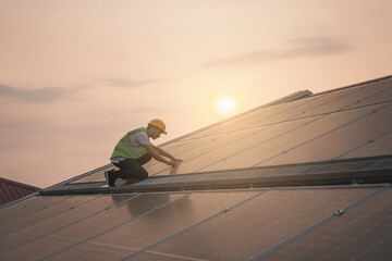Wall Mural - service engineer checking solar cell on the roof for maintenance if there is a damaged part. enginee