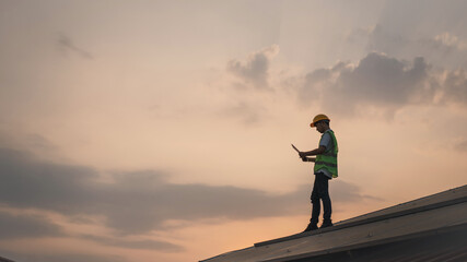 Wall Mural - service engineer checking solar cell on the roof for maintenance if there is a damaged part. enginee