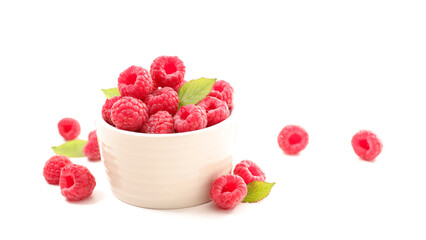 Wall Mural - bowl of raspberries fruits isolated on white background