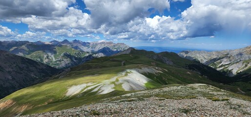 Canvas Print - Panoramic shot of the landscape of clouds reflected over the mountains