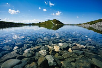 Lake with transparent water in a summer day