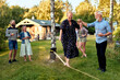 © Flamingo Images - Mature woman laughing on a slack line