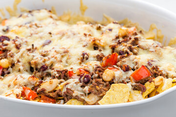 Wall Mural - nachos with minced beef , red pepper and beans