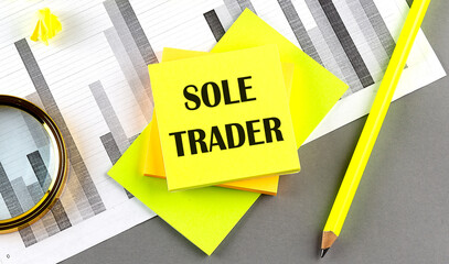 Poster - SOLE TRADER text on sticky on sticky on chart with pen