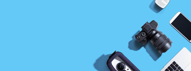 Poster - SLR camera with a laptop, a vr, a phone and a speaker - flat lay