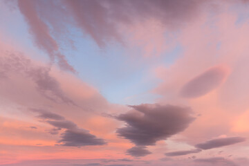 Wall Mural - Pink blue sky with clouds at beautiful sunset as natural background.