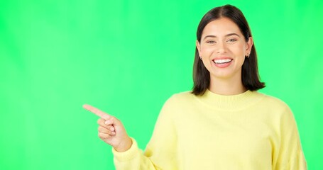 Poster - Portrait, point and branding with a woman on a green screen background in studio for guidelines or product placement. Hand gesture, advertising or options with an attractive happy female on mock up