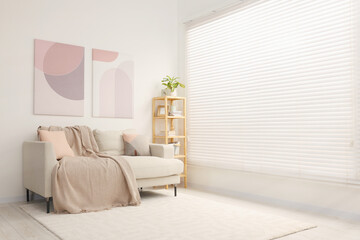 Aufkleber - Stylish living room interior with cozy sofa and wooden shelf. Space for text