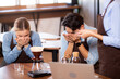 © NT_studio - Young man and woman learning making coffee and sniff bean with barista while laptop on desk at cafe, group people training drip coffee with entrepreneur, small business or SME.