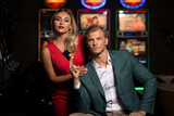 Fototapeta Tulipany - Portrait of Couple Holding Vip Card in Casino