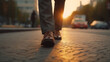 © andranik123 - Businessman walking on the street at sunset, closeup of legs. Generative Ai