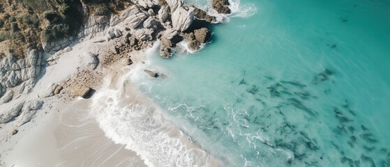 Poster - A beautiful picture of a rocky beach with a cliff from above.Aerial view. Panoramic shot. Generative AI