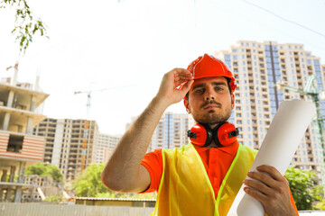 Wall Mural - Young man civil engineer in safety hat