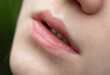 © schankz - The lips of a young girl as a background.