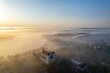 © Top Lithuania - Aerial beautiful spring morning fog view of Trakai Castle, Lithuania