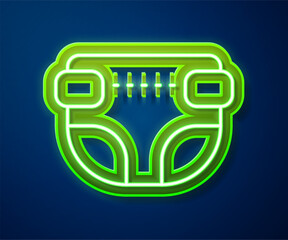 Poster - Glowing neon line Adult diaper icon isolated on blue background. Vector