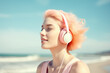 © Uncanny Valley - Young active girl jogging and doing activities on the beach with music with headphones on her ears. A warm sunny day on the beach, on the seashore. Generative AI.