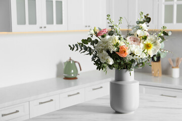 Canvas Print - Bouquet of beautiful flowers on white table indoors. Space for text