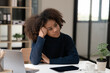 © Thitisak - Asian woman sitting stressed with being an office worker
