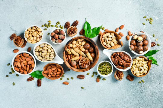 Natural background made from different kinds of nuts. Top view.