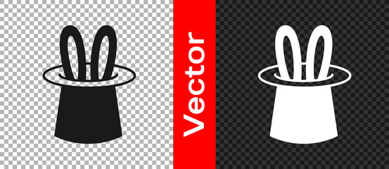 Sticker - Black Magician hat and rabbit ears icon isolated on transparent background. Magic trick. Mystery entertainment concept. Vector