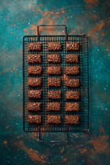 Wall Mural - Chocolate cookies with dark chocolate and nuts. Dessert. Top view. On a dark background. Space for text.