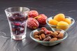 midday snack break with fruits, dates, and water, created with generative ai