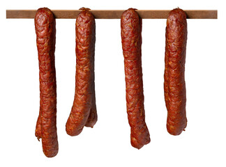 Sausage hung on a wooden peg to dry. Isolated background.