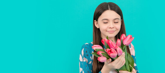 Poster - kid hold flowers for 8 of march. teen girl with spring bouquet on blue background. Banner of spring child girl with tulips flowers bouquet, studio portrait with copy space.