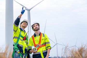 Poster - Engineers checking wind turbines,Renewable energy technology and sustainability,Alternative energy for future.